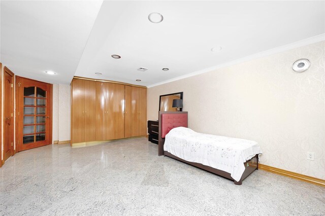 bedroom featuring crown molding