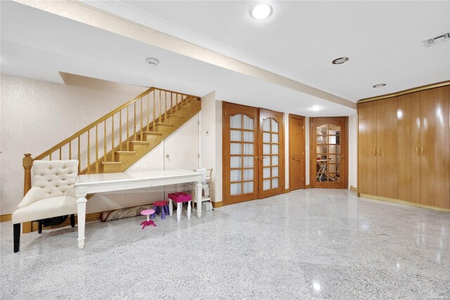 unfurnished living room with french doors