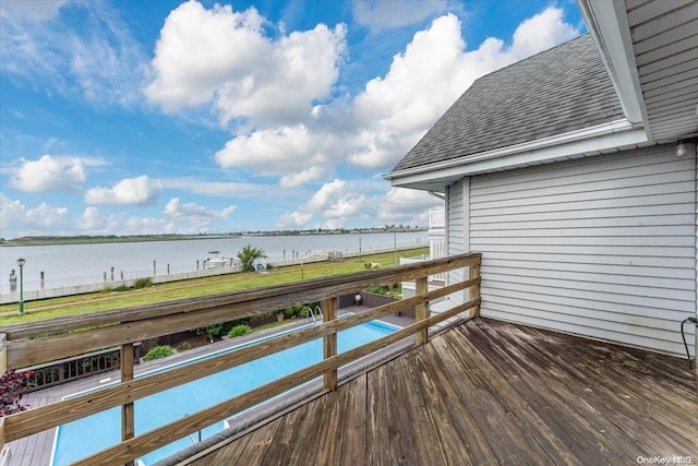 deck featuring a water view