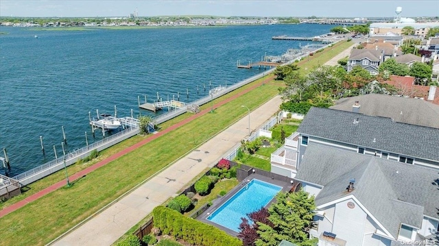 birds eye view of property featuring a water view