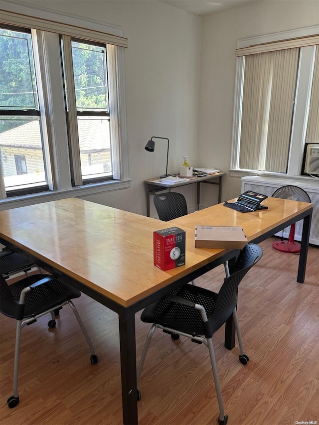 office with wood-type flooring