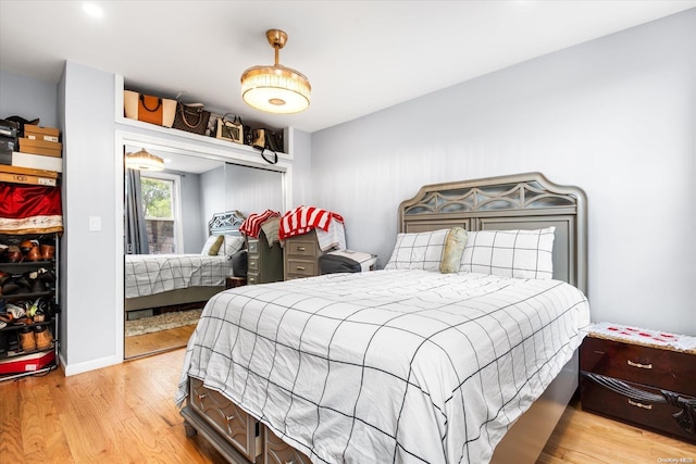 bedroom featuring light wood-type flooring