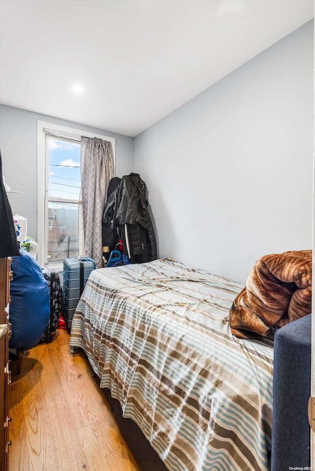 bedroom featuring hardwood / wood-style flooring