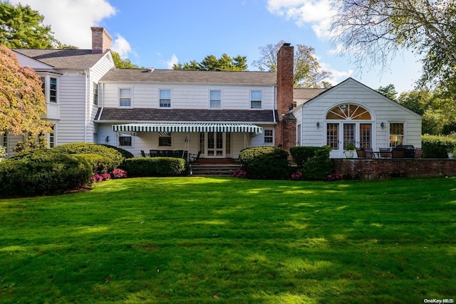 200 Cleft Rd, Mill Neck, NY 11765 - back of house with a lawn, a chimney, and french doors