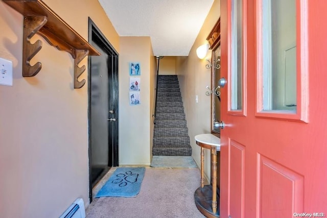 entrance foyer featuring carpet flooring