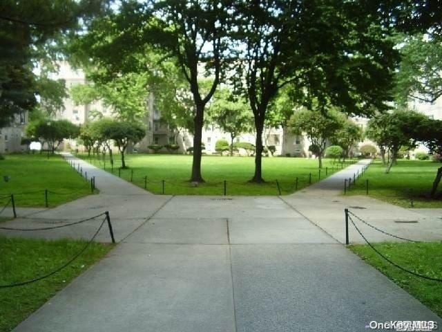 view of community featuring a yard