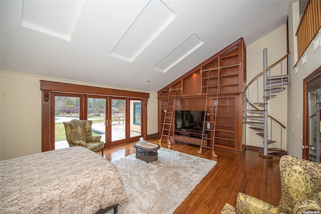 bedroom with access to exterior, french doors, dark hardwood / wood-style flooring, and vaulted ceiling