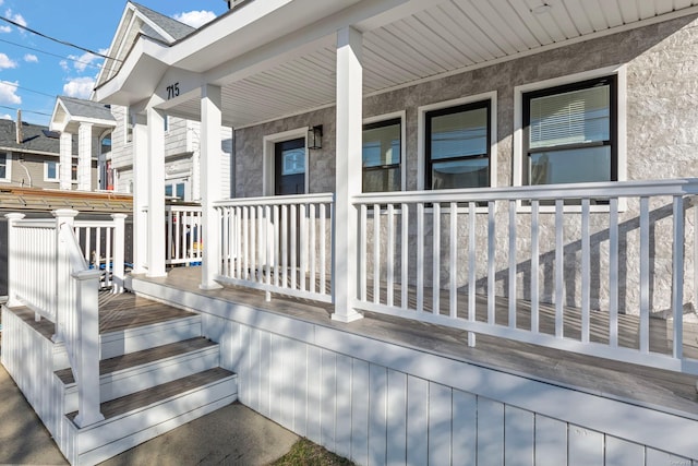 wooden deck featuring a porch