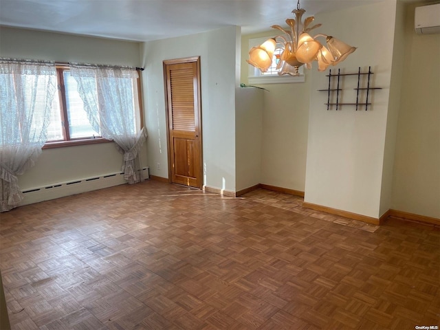 spare room featuring baseboard heating, parquet floors, a chandelier, and a wall mounted air conditioner