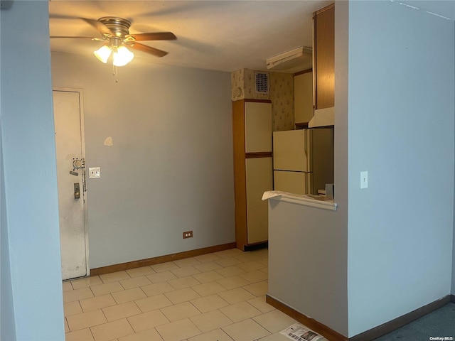 unfurnished room featuring ceiling fan