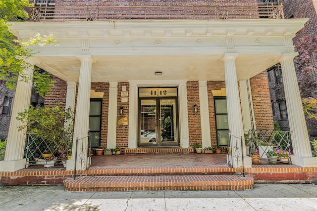 41-12 41st St Unit 3-H, Sunnyside, NY 11104 - doorway to property with a porch and brick siding