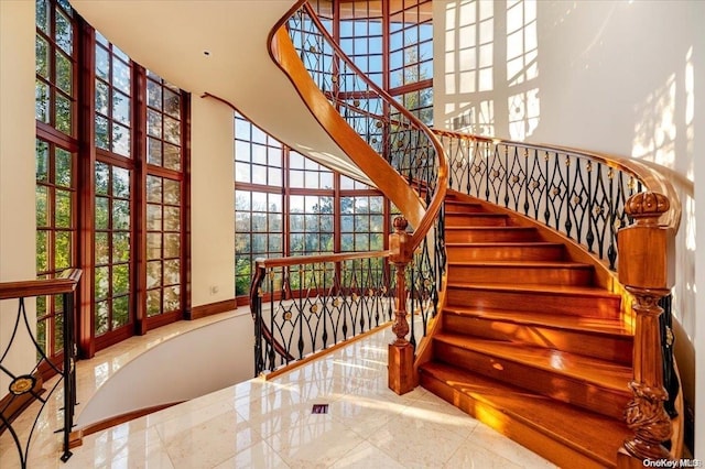 stairs with a towering ceiling