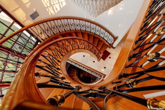 stairs featuring wood-type flooring