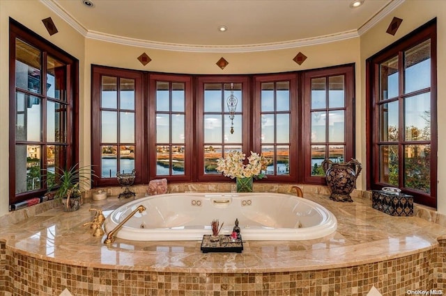 bathroom featuring a water view and ornamental molding