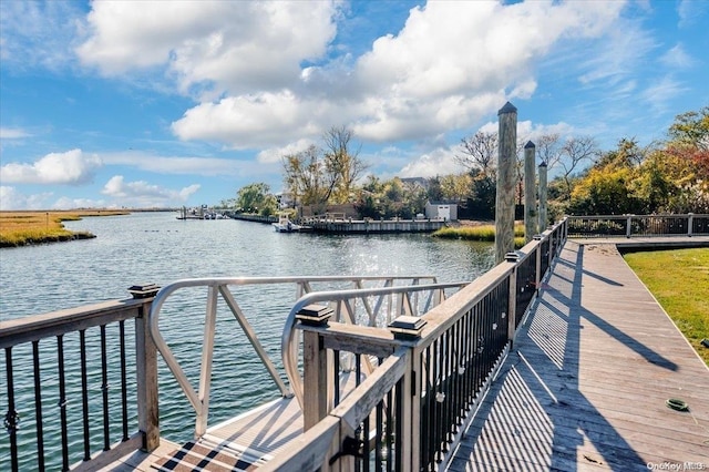 dock area featuring a water view