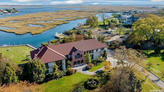 aerial view featuring a water view