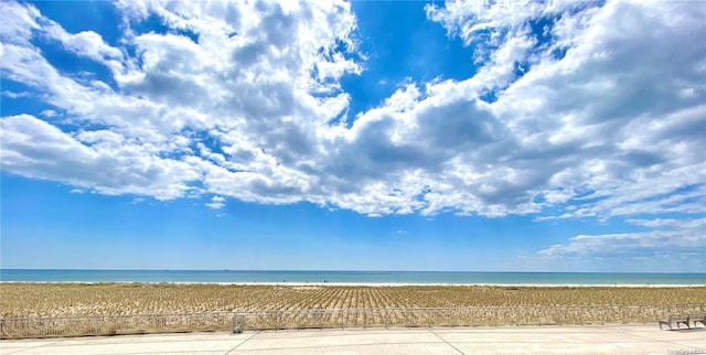 view of water feature with a beach view