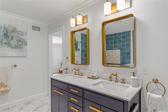 bathroom with vanity and crown molding