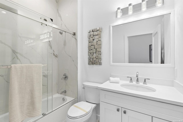21 Montauk Hwy Unit 5, Westhampton, NY 11977 - bathroom featuring vanity, shower / bath combination with glass door, and toilet