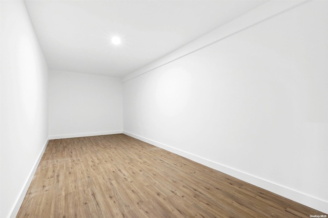 21 Montauk Hwy Unit 5, Westhampton, NY 11977 - empty room with baseboards and light wood-style flooring