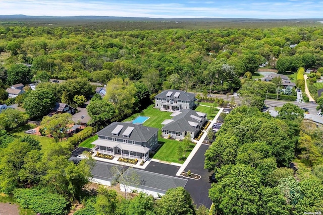 21 Montauk Hwy Unit 5, Westhampton, NY 11977 - view of property location with a forest and nearby suburban area
