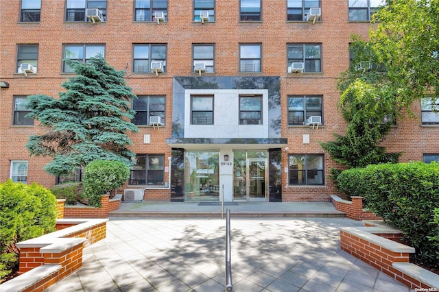 99-40 63rd Rd Unit 9Z, Rego Park, NY 11374 - view of apartment building / complex featuring cooling unit