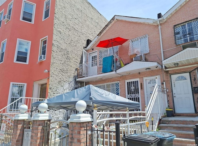 1090 Hancock St, Brooklyn, NY 11221 - view of front facade with stucco siding