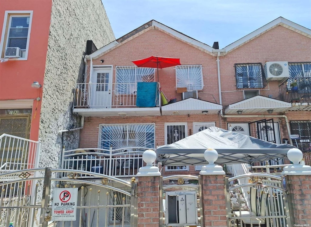1090 Hancock St, Brooklyn, NY 11221 - view of building exterior featuring cooling unit and ac unit