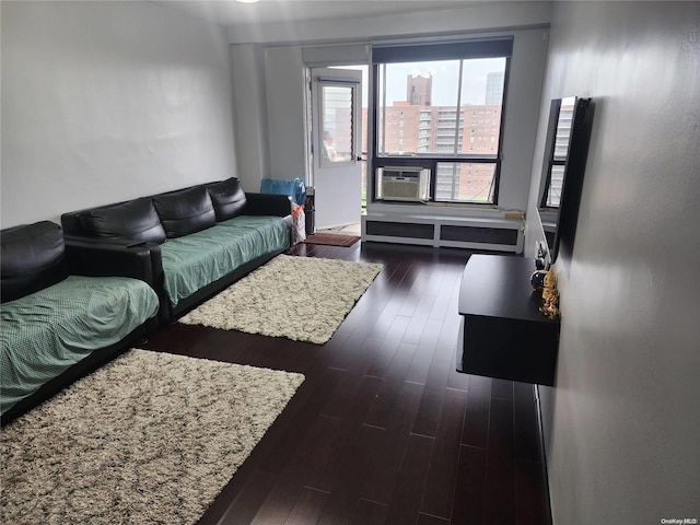 living room with dark hardwood / wood-style floors