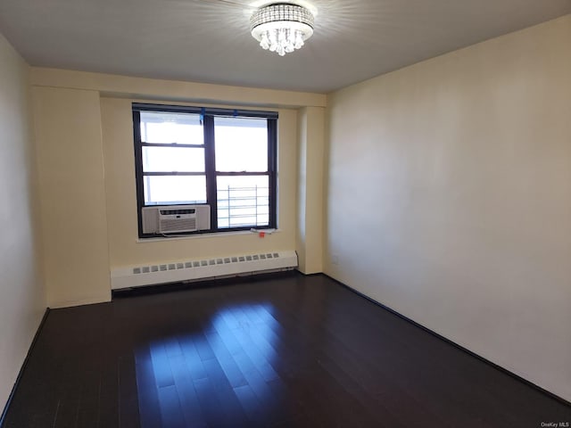 unfurnished room with a baseboard radiator, a chandelier, dark wood-style floors, and cooling unit