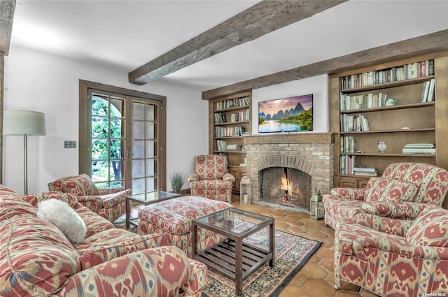 living room with a fireplace, french doors, and beamed ceiling