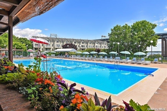 view of pool featuring a water slide