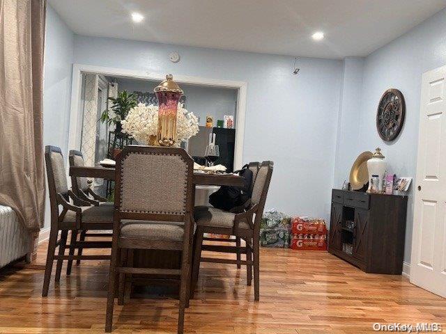 dining space with light wood-type flooring