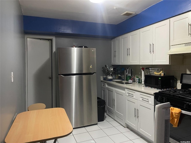 kitchen with black appliances, white cabinets, sink, decorative backsplash, and extractor fan