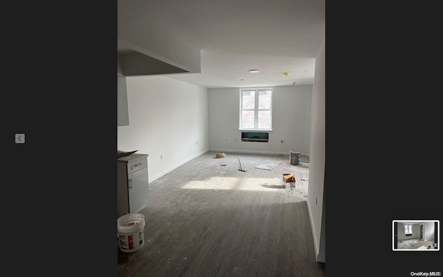 unfurnished living room with light hardwood / wood-style flooring