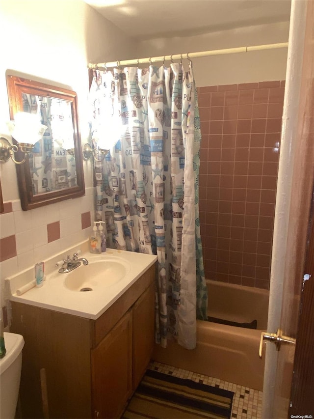 full bathroom featuring shower / bathtub combination with curtain, backsplash, tile patterned floors, toilet, and vanity