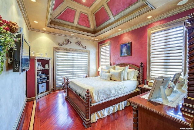 bedroom featuring crown molding, dark hardwood / wood-style flooring, and coffered ceiling