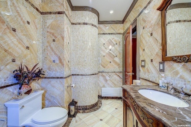 bathroom featuring tile walls and ornamental molding