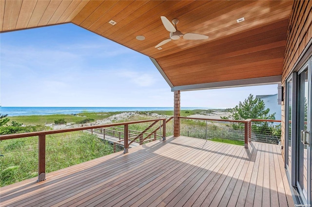 451 Dune Rd, Westhampton Beach, NY 11978 - wooden terrace with view of water and beach and ceiling fan