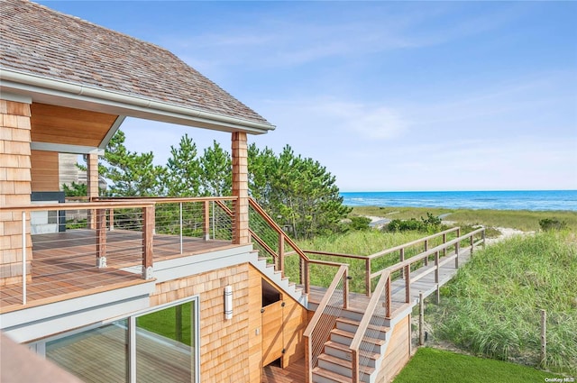 451 Dune Rd, Westhampton Beach, NY 11978 - deck featuring stairs and view of water and beach