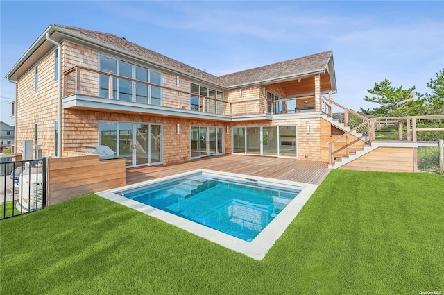 451 Dune Rd, Westhampton Beach, NY 11978 - rear view of house featuring a deck, a balcony, and stairway