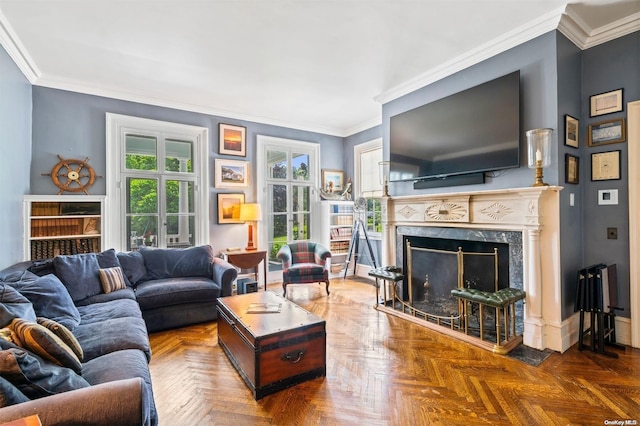 living room with parquet floors, a fireplace, and ornamental molding