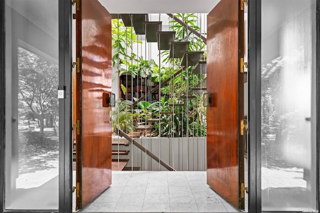 18 Hicks Ln, Sands Point, NY 11050 - doorway to outside featuring stairway