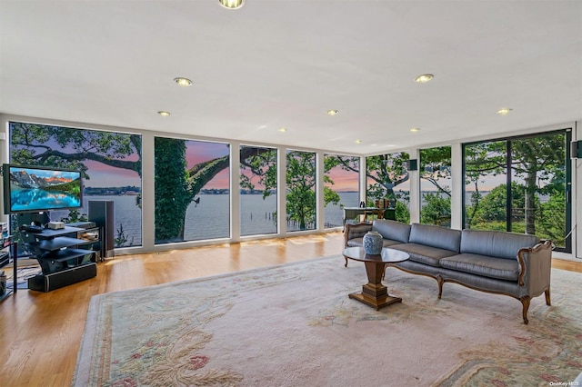 18 Hicks Ln, Sands Point, NY 11050 - living area featuring wood finished floors, recessed lighting, and a wall of windows