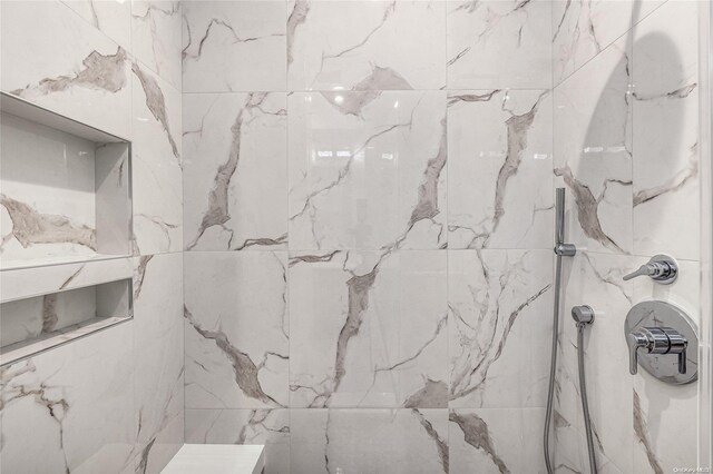 16 Ocean Watch Ct Unit 16, Freeport, NY 11520 - bathroom with a marble finish shower