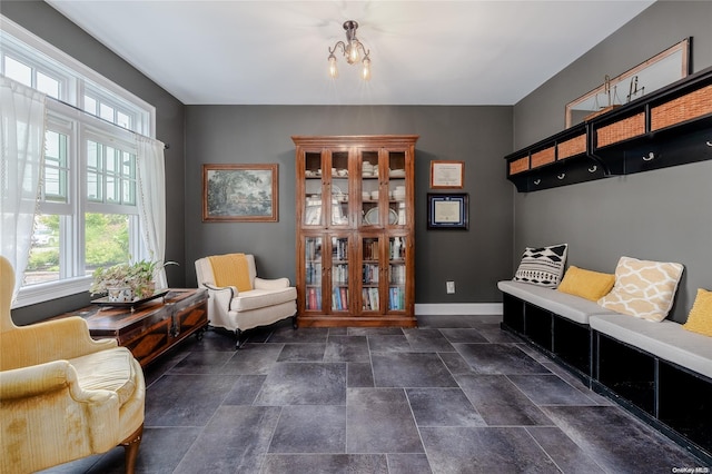 mudroom with a notable chandelier