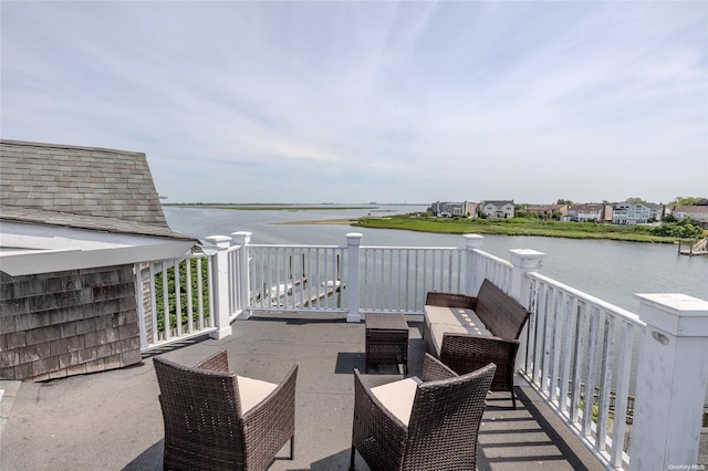 view of patio / terrace featuring a water view