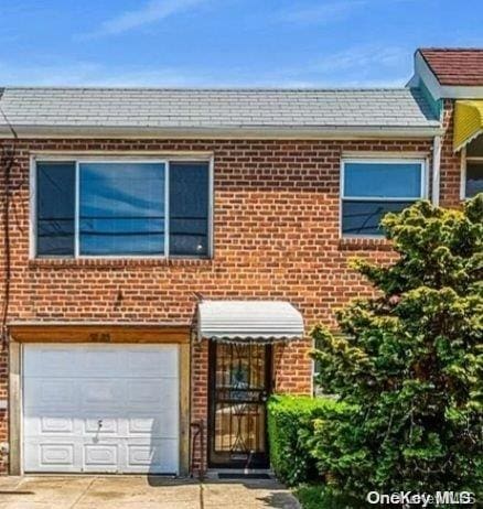 view of property featuring a garage