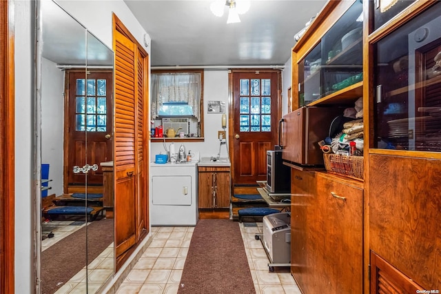 interior space featuring cabinets and washer / dryer