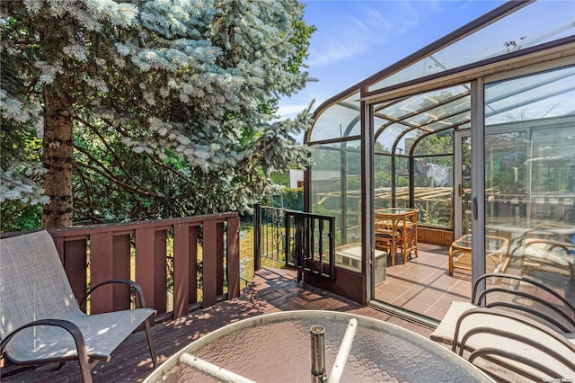 deck featuring a sunroom